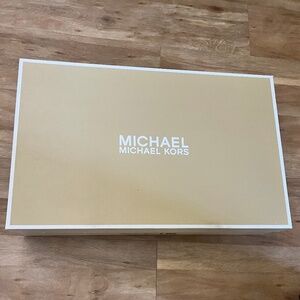 Michael Kors suede boots.